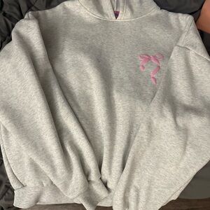 Edikted Light Gray Hoodie with Pink Bow Detail